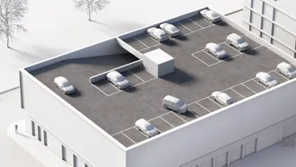 An architect model of a building with a parking deck on top of the building