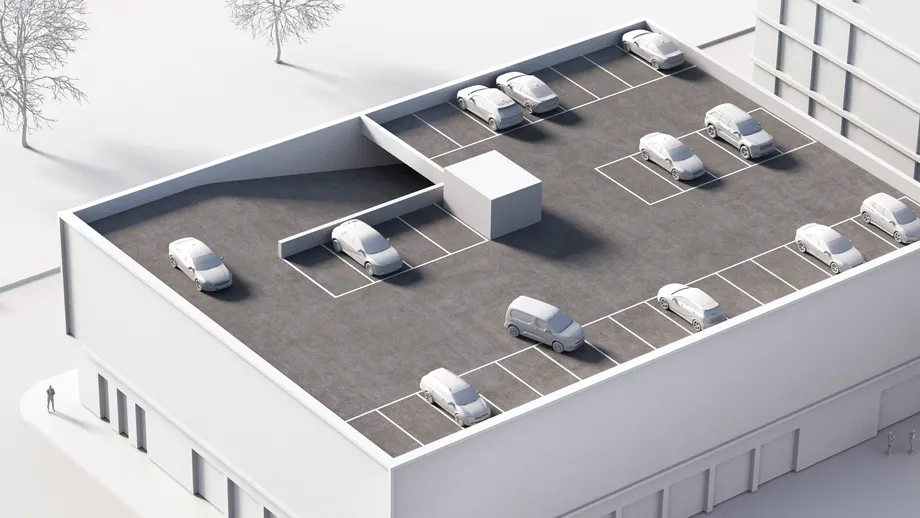 An architect model of a building with a parking deck on top of the building